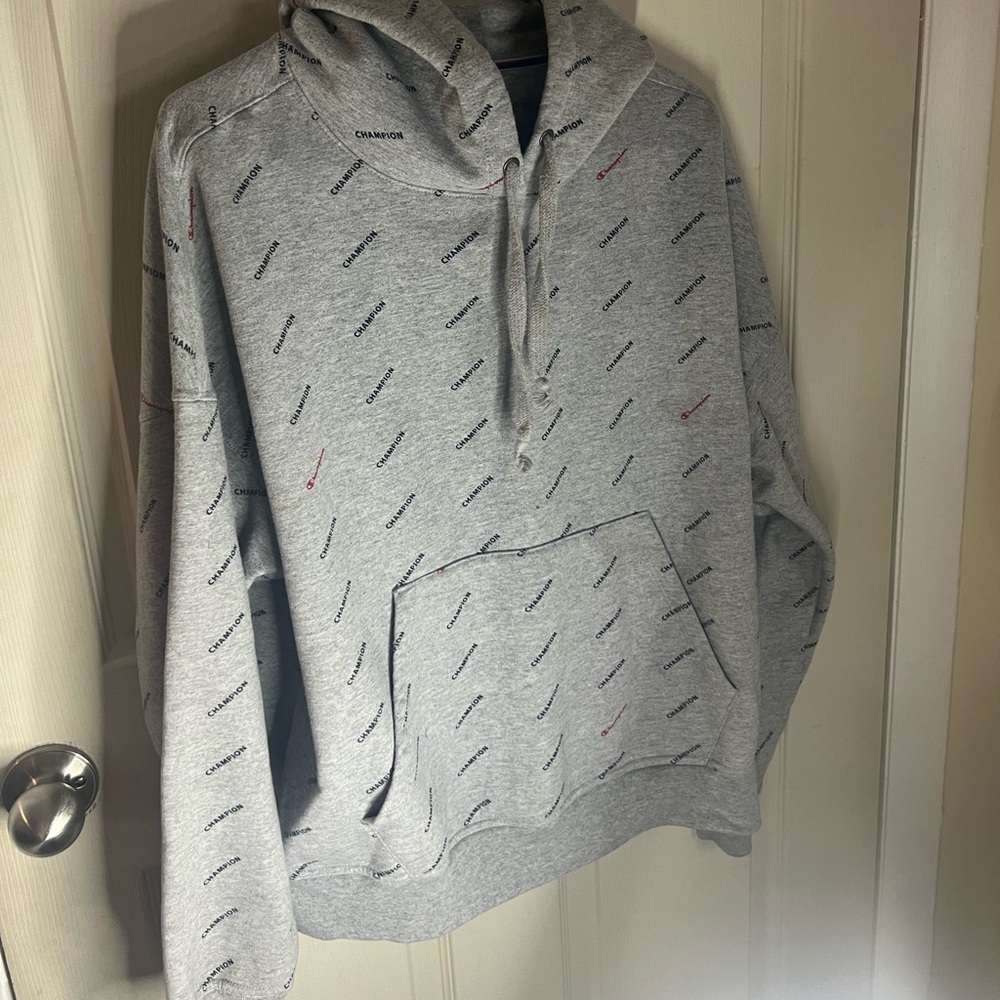 Champion, XL, gray with the word “champion” all over